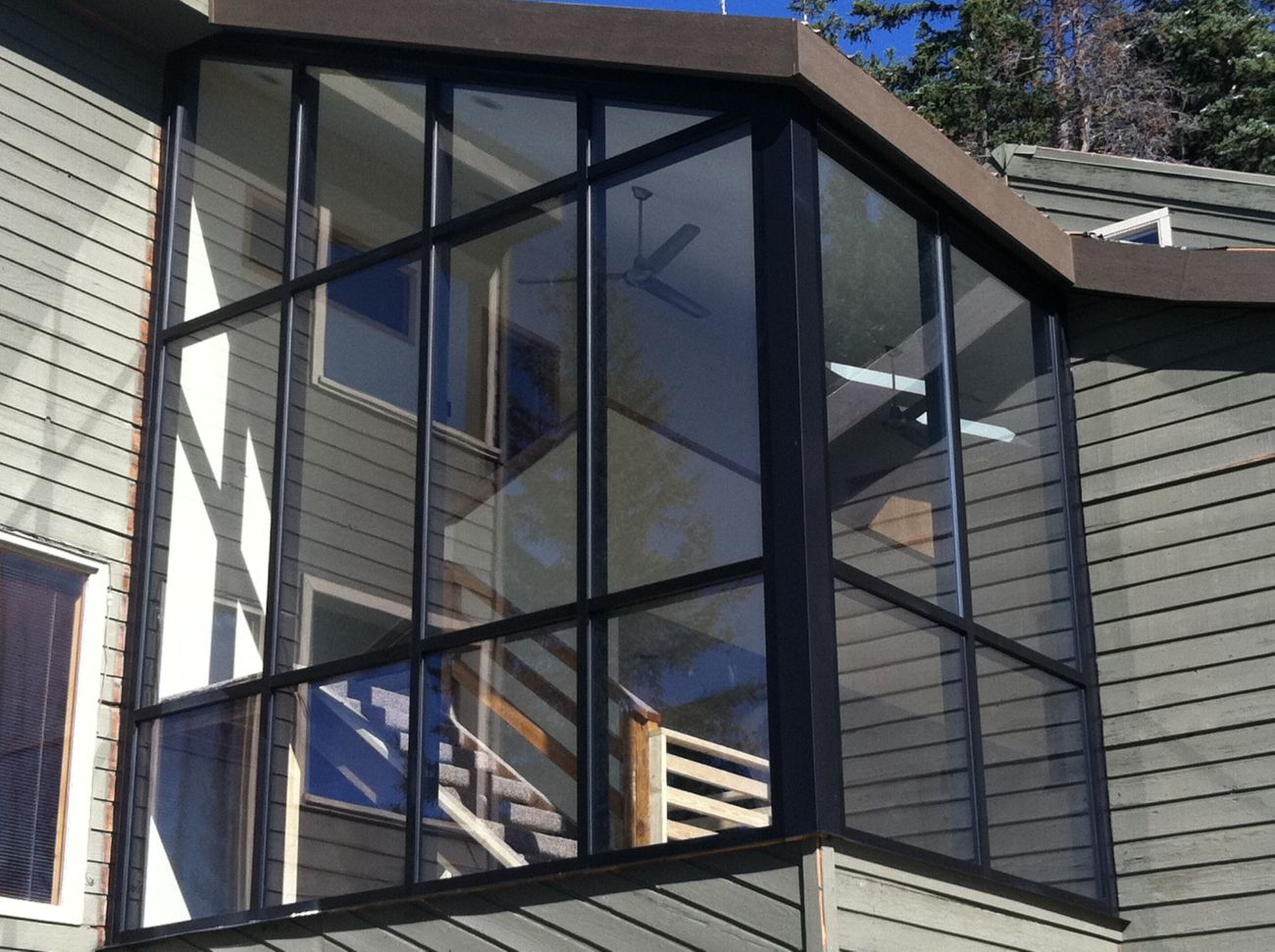 Corner glass window wall on a mountain home